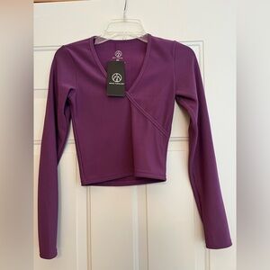 New Move Theology purple long sleeve wrap crop ribbed top. XS